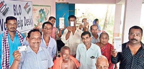 Voters at a polling booth in Patkura on Saturday (Photo | EPS)