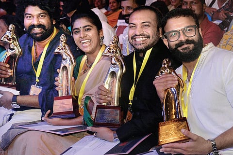 Actors Jayasurya, Soubin Shahir, Nimisha Sajayan and Joju George with their awards during the 49th Kerala State Film Awards distribution function in Tiruvananthapuram on Saturday | Vincent Pulickal