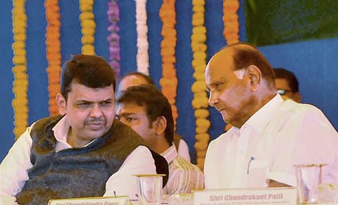Maharashtra Chief Minister Devendra Fadnavis with NCP chief Sharad Pawar. (File photo| PTI)