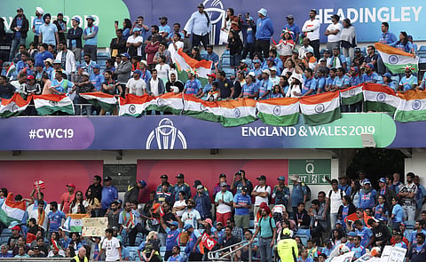 Indian cricket fans cheer for their team during the Cricket World Cup match between India and Sri Lanka at Headingley in Leeds, England, Saturday, July 6, 2019. | AP