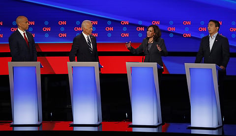 From left, Sen. Cory Booker, D-N.J., former Vice President Joe Biden, Sen. Kamala Harris, D-Calif., and Andrew Yang. (Photo | AP)