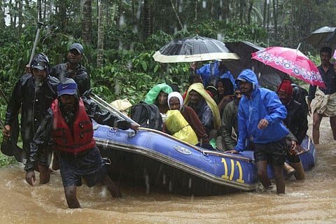 Family rescued by private rafters near Murnad in Kodagu. (Photo | EPS)