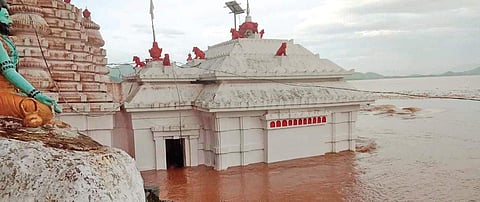 Water surrounds Maa Bhattarika temple in Badamba block of Cuttack district following heavy rains on Wednesday (Photo | EPS)