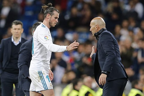 Real Madrid's Gareth Bale. left, shakes hands with Real Madrid's head coach Zinedine Zidane. (Photo | AP)