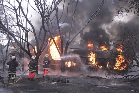 Fire fighters try to extinguish a Petrol Tanker blaze, Saturday, Aug. 10 2019, in Morogoro, Tanzania. | ( Photo | AP )