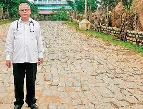 Dr George Mathew