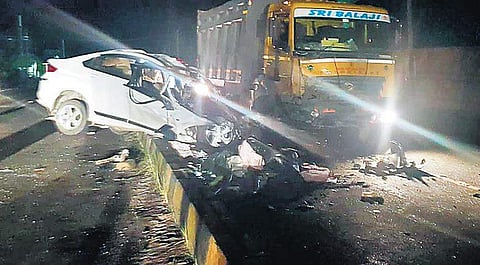 The car which jumped a road median and crashed into a tipper on Attibele-Sarjapur Road on Monday night | Express