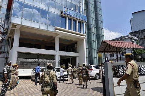 Security personnel stand guard outside an NRC centre before the final draft publication in Guwahati Friday August 30 2019. (Photo | PTI)