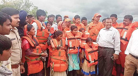 Eighteen people were rescued from a submerged island in Lingsugur of Raichur by an NDRF team on Tuesday | Express