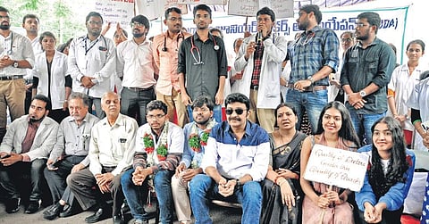 Film actor Dr Rajasekhar and his wife Jevitha, along with their daughter extend support to TJUDA doctors, during the dharna organised against the implementation of NMC Bill, at Dharna Chowk in Hyderabad on Thursday | S Senbagapandiyan