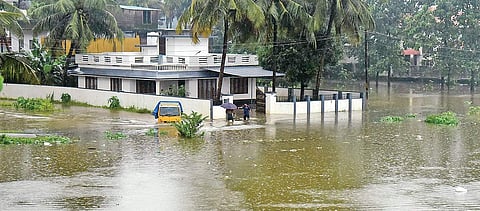 A house surrounded by water at Perumbavoor on Thursday | Albin Mathew