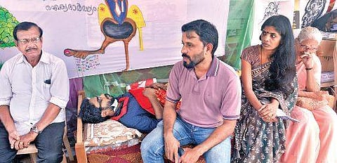 Members of the Aikya Malayala Prasthanam on hunger strike in front of the Kerala State Public Service Commission headquarters at Pattom Vincent Pulickal