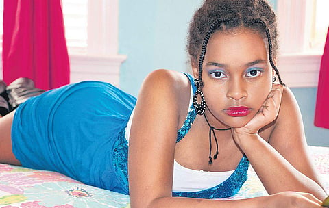 Céleste, daughter of Colette Veasey-Cullors(inset), was one of the subjects in Colette’s 2013 series, Adultification of Girls