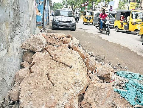 Some parts of the broken roads are used to park vehicles P Jawahar