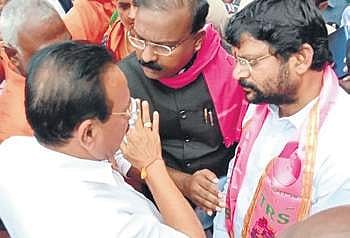 TRS MP B Venkatesh and MLA K Chander argue with Union Fertiliser Minister DV Sadananda Gowda on Thursday
