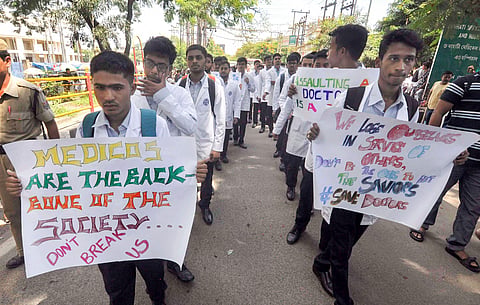 Senior and junior doctors take out a protest rally against the alleged assault on a senior doctor Deben Dutta 73 at a tea garden that led to his death at Jorhat district in Guwahati Tuesday September 03 2019. | PTI