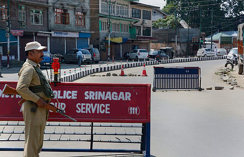 Security personnel stand guard along a street on the 30th day of restrictions after the abrogration of the provisions of Article of 370 in Srinagar Tuesday September 03 2019. | PTI