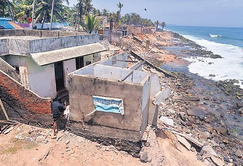 Houses collapsed at Beemapalli due to sea erosion in the first week of August Vincent Pulickal