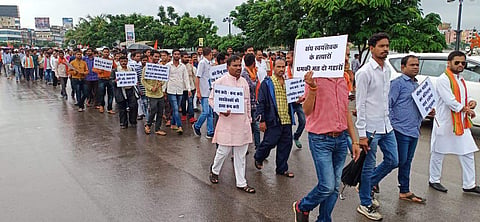 The RSS activists from various districts of the state attended the march, some carried banners and placards protesting against the violence. | Express Photo Services