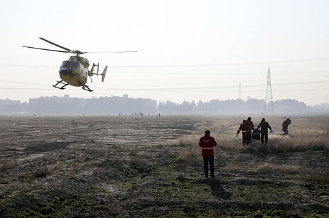 Rescue team work at the scene where an Ukrainian plane crashed in Shahedshahr, southwest of the capital Tehran, Iran. (Photo | AP)