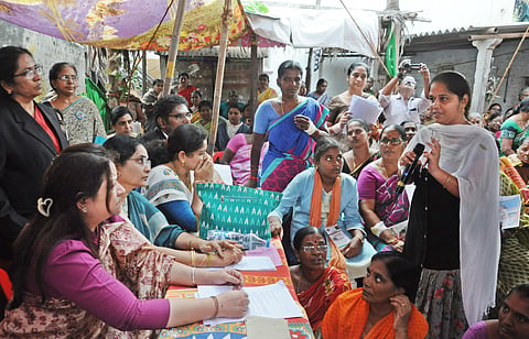 The fact-finding team of National Commission for Women interacts with women at Thullur village in Guntur district on Sunday| Prashant Madugala