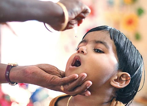 A child being administered pulse polio drops at a booth in Marutheri Anganwadi in Kozhikode on Sunday (File Photo | TP Sooraj, EPS)