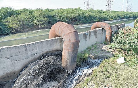 Raw sewage gushes down from a broken sewage pipe | Martin Louis