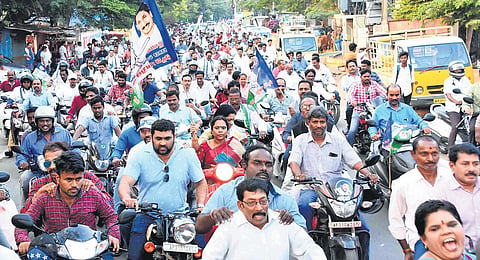 YSRC workers taking out a bike rally from party office to celebrate the Assembly approval to make Visakhapatnam as executive capital, at Maddilapalem in Vizag on Monday. (Photo| EPS)