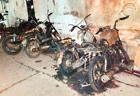 The motorcycles which were set on fire in Guntur on Saturday | Express