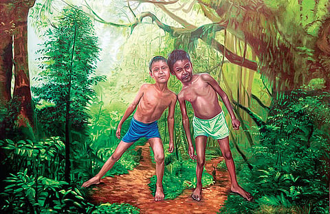 Artist Rajesh Ram with his artworks