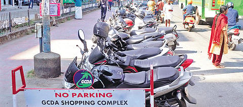 Two-wheelers parked near a no-parking zone at in the city A Sanesh