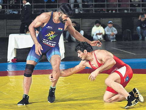 Jitender Kumar (R) in action against Sandeep Mann during the Olympic qualifiers selection trials at the IG Stadium in New Delhi on Friday. (Photo| EPS/PARVEEN NEGI)