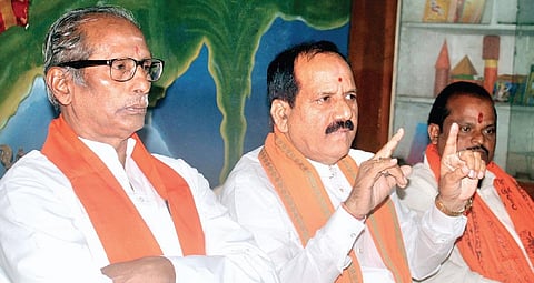 (Left) VHP’s joint general secretary Y Raghavulu and the organisation’s president of Telangana M Rama Raju (centre), addressing a press meet at Koti Office in Hyderabad, on Monday| Sathya keerthi