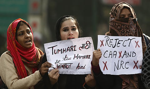 Protestors including students and local residents during a demonstration against the CAA outside Jamia Millia Islamia University. (Photo | Arun Kumar P, EPS)