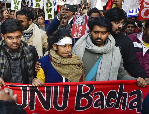 JNU Students Union President Aishe Ghosh and other students during a protest march from Mandi House to HRD Ministry, demanding removal of V-C. (Photo | PTI)