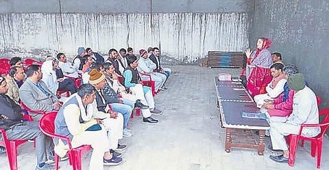 Nauksham Chaudhary (in red salwar) addresses a gathering of 50-60 people and visits 5-6 villages in Muslim-majority Mewat everyday | Express
