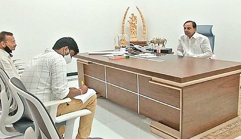 Chief Minsiter K Chandrasekhar Rao shares details of his properties with the Village Secretary at his Erravalli farmhouse on Saturday