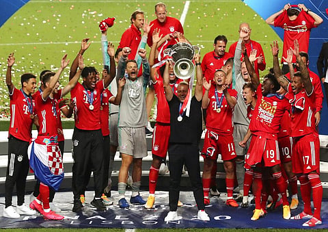 Bayern Munich raises the UEFA Champions League trophy after defeating PSG 1-0. (Photo | AP)