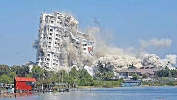 Jain Coral Cove, one of the five apartment towers which violated CRZ norms, being demolished through controlled implosion at Maradu | B P DeePu
