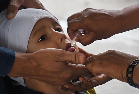 Medical staff administering polio drops to a baby. (Photo| P Ravindra Babu, EPS)
