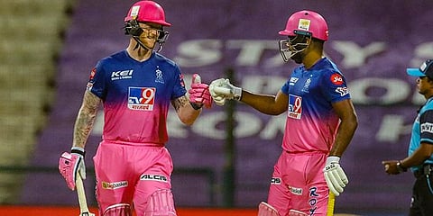 Ben Stokes and Sanju Samson of Rajasthan Royals during IPL match against Mumbai Indians at the Sheikh Zayed Stadium. (Photo | PTI)