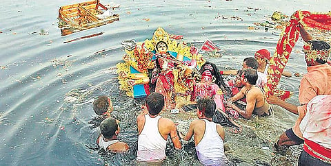 It is still not clear if there is any bar on the number of people who can accompany the idol till the immersion ghat.