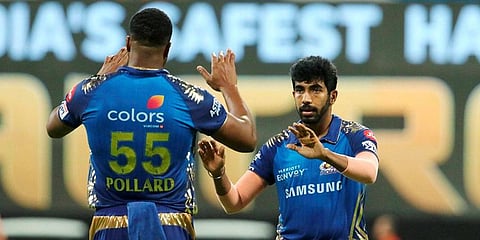 Jasprit Bumrah of Mumbai Indians celebrates the wicket of Shivam Dube of Royal Challengers Bangalore during IPL match at the Sheikh Zayed Stadium. (Photo | PTI)