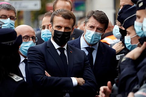 French President Emmanuel Macron visit the knife attack spot in Nice. (Photo| AFP)