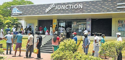 File picture of people beelining outside an Aavin parlour in Chennai