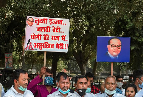 Dalit leader Udit Raj with party workers during their Delhi to Hathras Nyay March demanding justice for the 19-year-old Dalit woman who died after being allegedly gang raped. (Photo | PTI)
