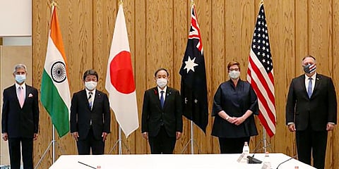 External Affairs Minister Dr S Jaishankar (extreme left) met Prime Minister of Japan Yoshihide Suga along with other Quad Foreign Ministers, in Tokyo on Tuesday. (Photo| ANI)