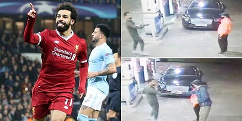 Liverpool striker Mohamed Salah helps a homeless man at a petrol station. (Photo | AP, YouTube Screengrab)