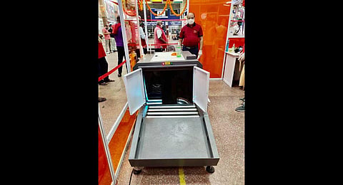 The luggage of passengers arriving to board trains is sanitized for a nominal fee of Rs 10 by UV light sanitizer machines.