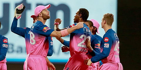 Rajasthan Royals' Jofra Archer celebrates the wicket of Delhi Capitals batsman Shikhar Dhawan during an IPL 2020 match. (Photo| PTI)